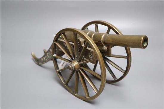 A bronze model canon, length 32cm
